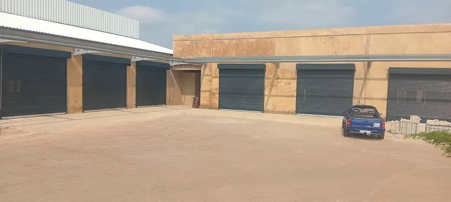 Commercial complex with charcoal roller shutter doors