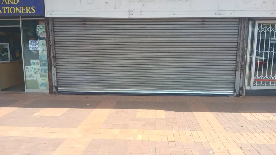 Roller shutter on a shopfront in a retail strip